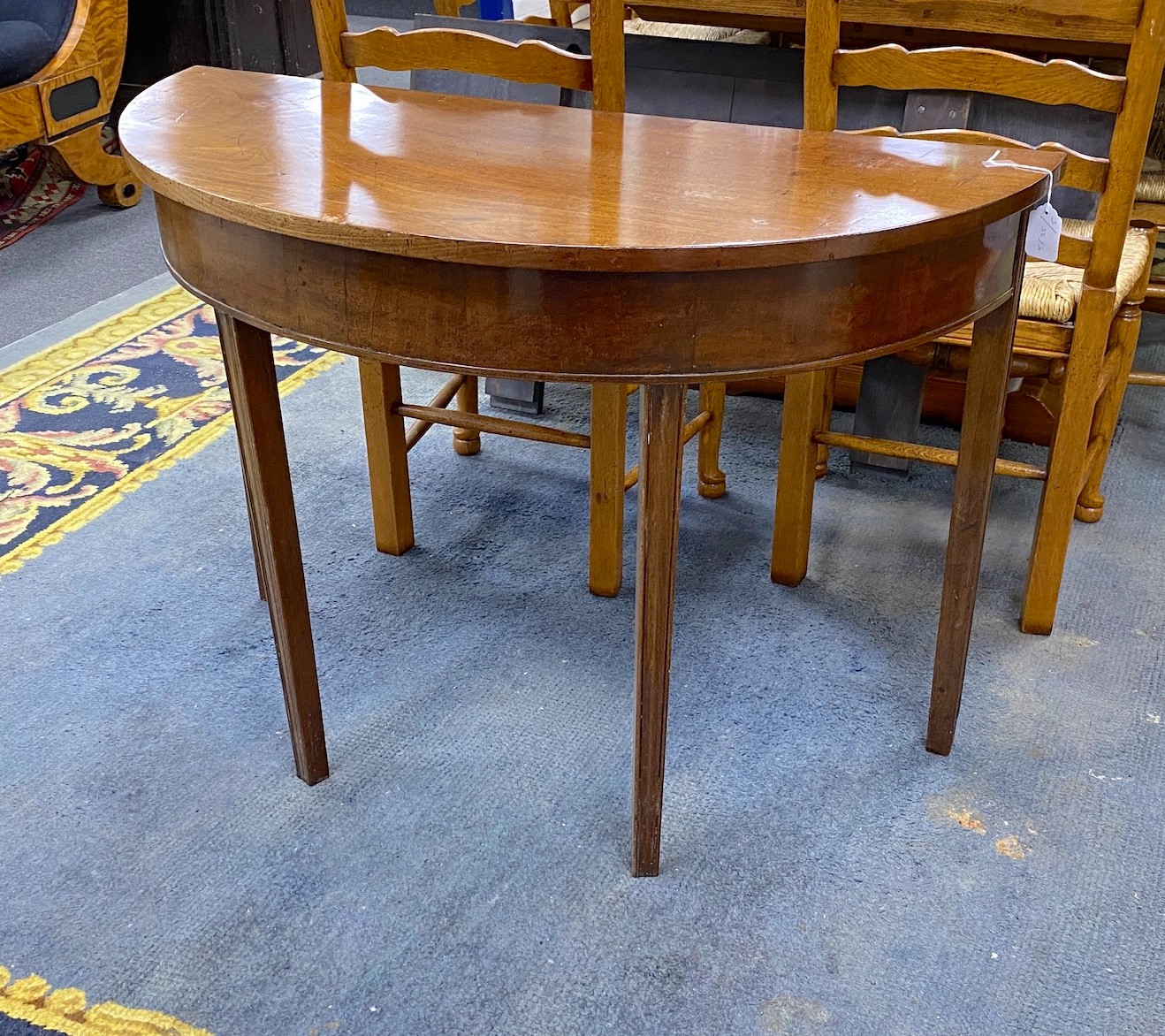 A George III mahogany demi-lune side table, length 104cm, depth 48cm, height 73cm